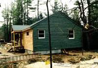 Staining the exterior in between snow storms